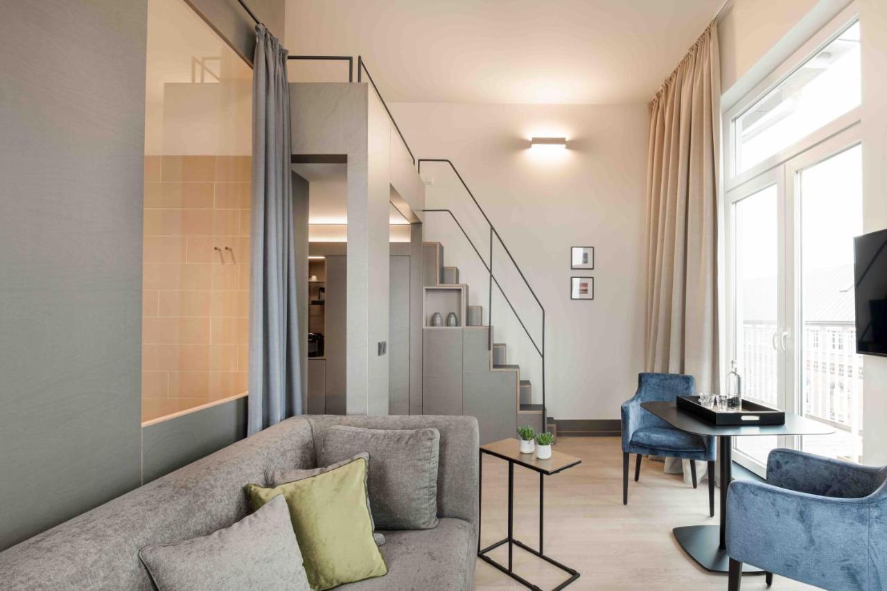 Oberdeck Studio Apartments - Adults Only Hamburg Exterior photo A suite at the Hotel